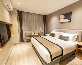 Shanghai Joyful Yard Hotel-Free Shuttle Bus To Pudong Airport And Disneyland - Shanghai - Dormitor