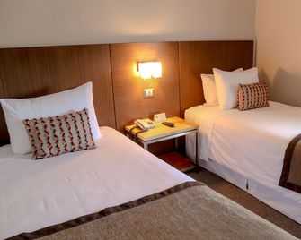 Hotel Martin Gusinde - Puerto Natales - Schlafzimmer
