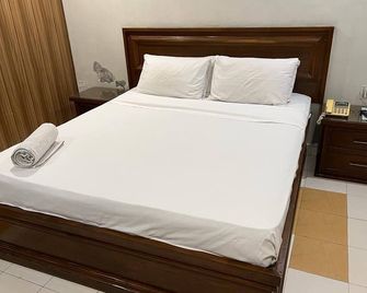 Lords Inn Hotel - Faisalābād - Bedroom