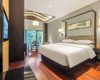 Echeng Hotel(Liuzhou Wanxiangcheng Yaobu Ancient Town) - Liuzhou - Bedroom