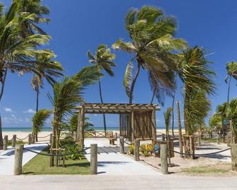 Ykutiba Imbassaí - duplex frente mar com jardim - Mata de São João - Patio