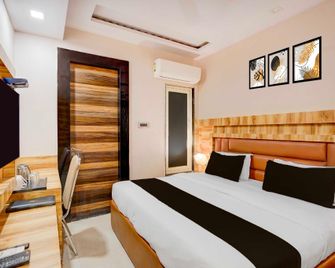Pop 84622j OYO Townhouse Csjmu Kanpur Formerly Shree Dev Villa - Kanpur - Slaapkamer