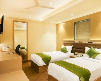 Treebo Hoops, Near Kolkata Airport - Kolkata - Bedroom