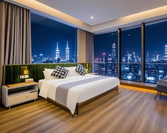 Youting High-altitude Hotel (Chongqing Guanyinqiao Jiujie Branch) - Chongqing - Bedroom