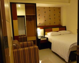 Sumber Ria Hotel - Gorontalo - Habitación