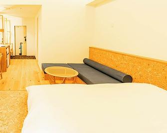 Twin room with bathroom 2F / Oshimagun Kagoshima - Amami - Wohnzimmer