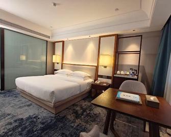 Huayun Hotel - Shangrao - Bedroom