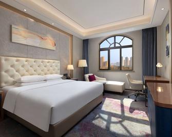 Ramada By Wyndham Zhumadian West Station - Zhumadian - Bedroom