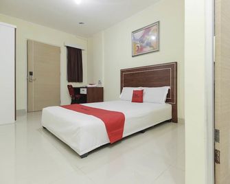 RedDoorz Near Rs Bhayangkara Palembang - Palembang - Schlafzimmer