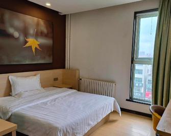 7 Days Inn Taian Dongpingxi Hualian - 泰安（タイアン） - 寝室