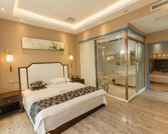 Sunian Zen Hotel - Qiannan - Bedroom