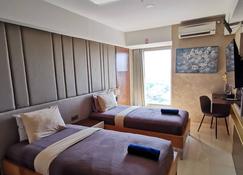Warhol Residence at Louis Kienne Semarang Simpang Lima - Semarang - Bedroom