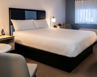 Skky Hotel - Whitehorse - Schlafzimmer