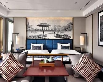 Rebecca Hotel (Xuchang Caowei Ancient Town Pangdonglai Times Square) - Xuchang - Bedroom