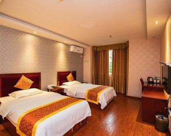Chongqing Vikeduo Business Hotel (Banan Huaxi University of Technology) - Chongqing - Habitación