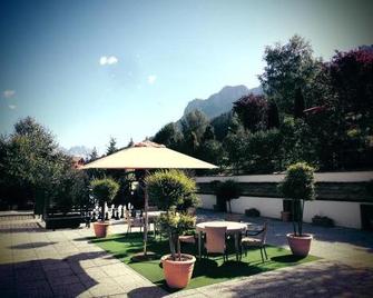 Belvedere Dolomites Flower Hotel - Moena - Patio