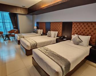 Momo Inn - Bogra - Bedroom