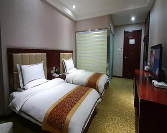 Starway Hotel Zhangye Runquan Lake - Zhangye - Bedroom