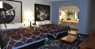 Super 8 by Wyndham Houston Hobby Airport South - Houston - Bedroom