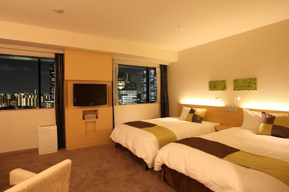 هوتل كيهان كيوباشي جراند - أوساكا - غرفة نوم