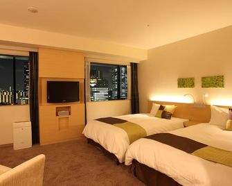 هوتل كيهان كيوباشي جراند - أوساكا - غرفة نوم