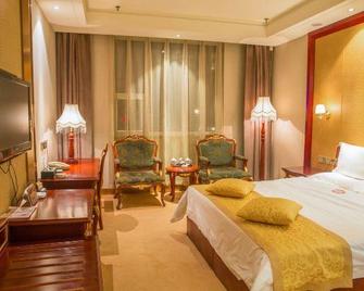 Dong Xing Grand Hotel - Lüliang - Habitación