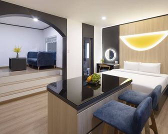 Viet Lotus Saigon Hotel - הו צ'י מין סיטי - חדר שינה