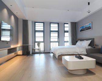Wutonghui Hotel (Suizhou Wanda Plaza Branch) - Suizhou - Slaapkamer
