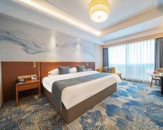 Zhucheng Huaxu Hotel (Dinosaur Park) - Rizhao - Slaapkamer