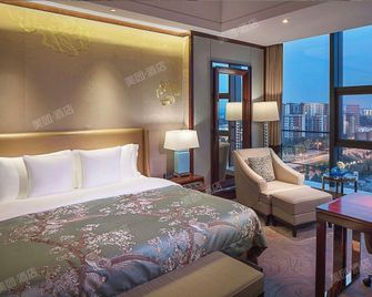 Changsha Xiandai Huatian Hotel - Changsha - Habitación