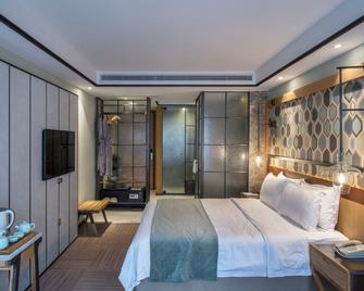 Hangzhou Cosy Park Hotel - האנגג'ואו - חדר שינה