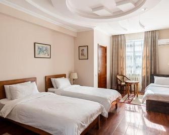 Soluxe Hotel - Bishkek - Bedroom