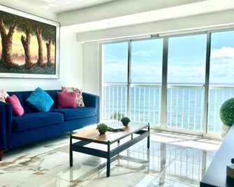 Charming Paradise Loft Style Malecon Apartment 715A - Santo Domingo (Dominicaanse Republiek) - Huiskamer