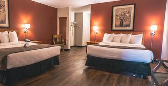 Quality Inn & Suites - Saskatoon - Slaapkamer
