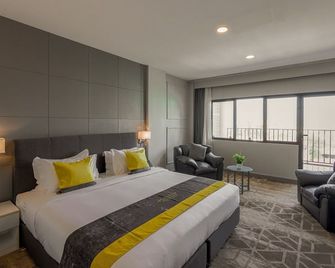 Manhattan Business Hotel - Malé - Bedroom