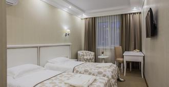 Elegant Hotel - Tomsk - Bedroom