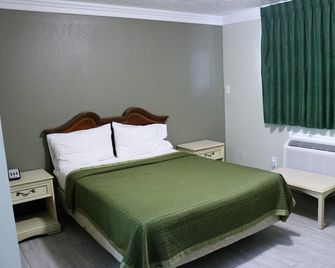 Deluxe Inn Motel - Lake Charles - Bedroom