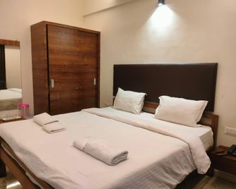 Hotel Arihant Plaza - Navsari - Habitación