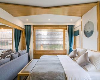 Wuhua Yishu Lijiang Flagship - Lijiang - Bedroom