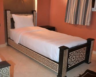 Inyan Dakhla Hotel - Dakhla - Schlafzimmer