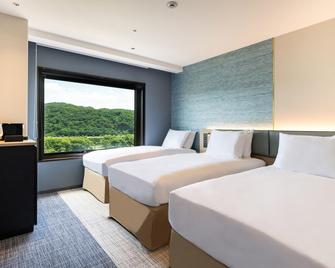ANA Holiday Inn Iwate Kitakami by IHG - Kitakami - Slaapkamer