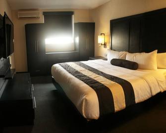 Hotel El Camino Inn & Suites - Reynosa - Yatak Odası