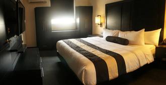 Hotel El Camino Inn & Suites - Reynosa - Camera da letto