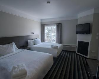 Northwinds Hotel Canmore - Канмор - Спальня