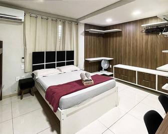 The Férias | Suites Luxo - Cabo Frio - Quarto