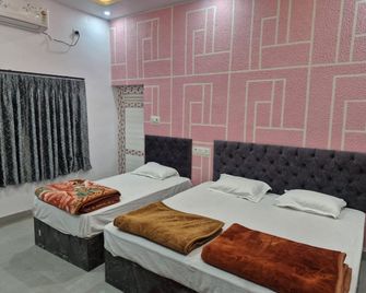 Krishna Inn - Prayagraj - Bedroom