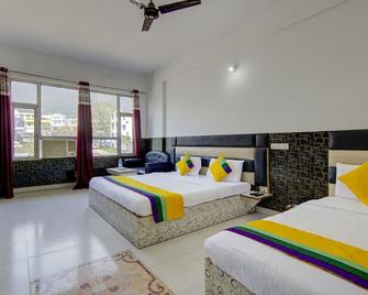 Itsy Hotels Satya Shree - Katra - Slaapkamer