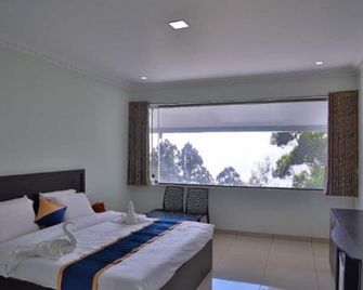 Winter Garden Resorts - Munnar - Yatak Odası