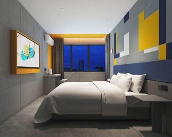 7 Days Inn Yueyang Ba Ling Middle Road Fu You Branch - Yueyang - Bedroom