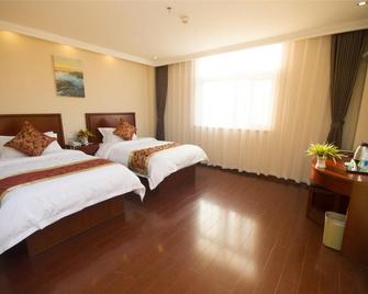 Greentree Inn Shandong Zaozhuang Tengzhou East Xueyuan Road Guiheyuan Business Hotel - Zaozhuang - Slaapkamer